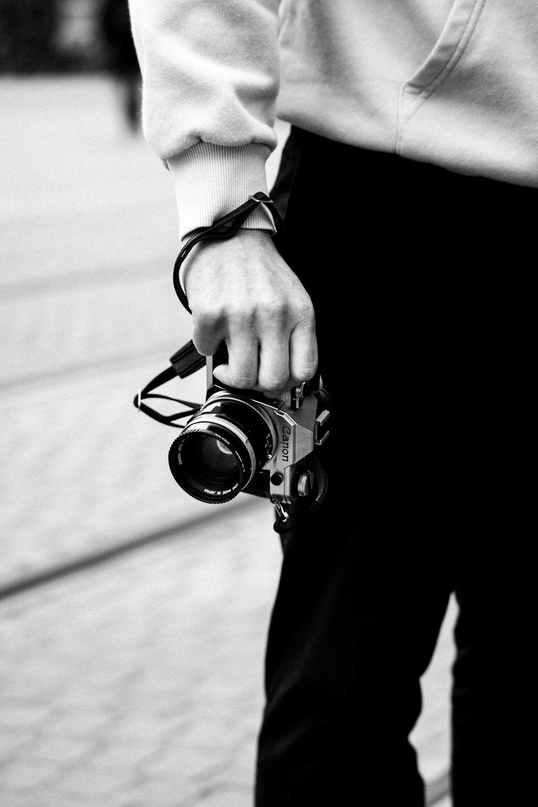 Press photographer holding camera