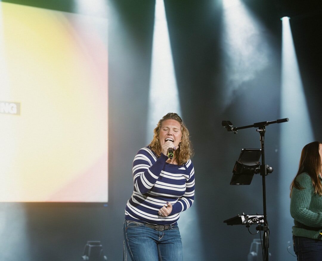 woman smiling on stage